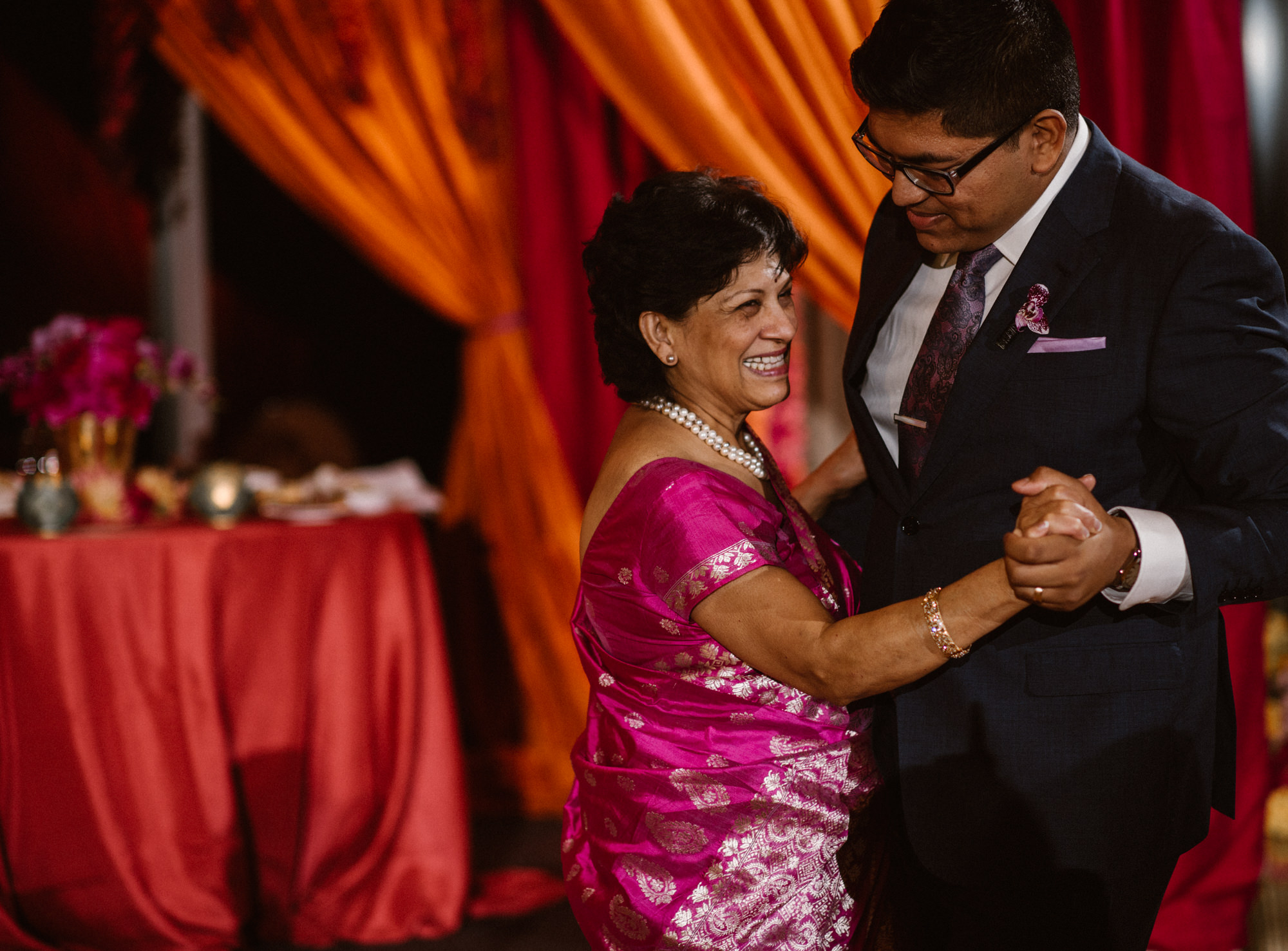 Neel dances with his mom at his wedding reception at the Four Seasons Seattle