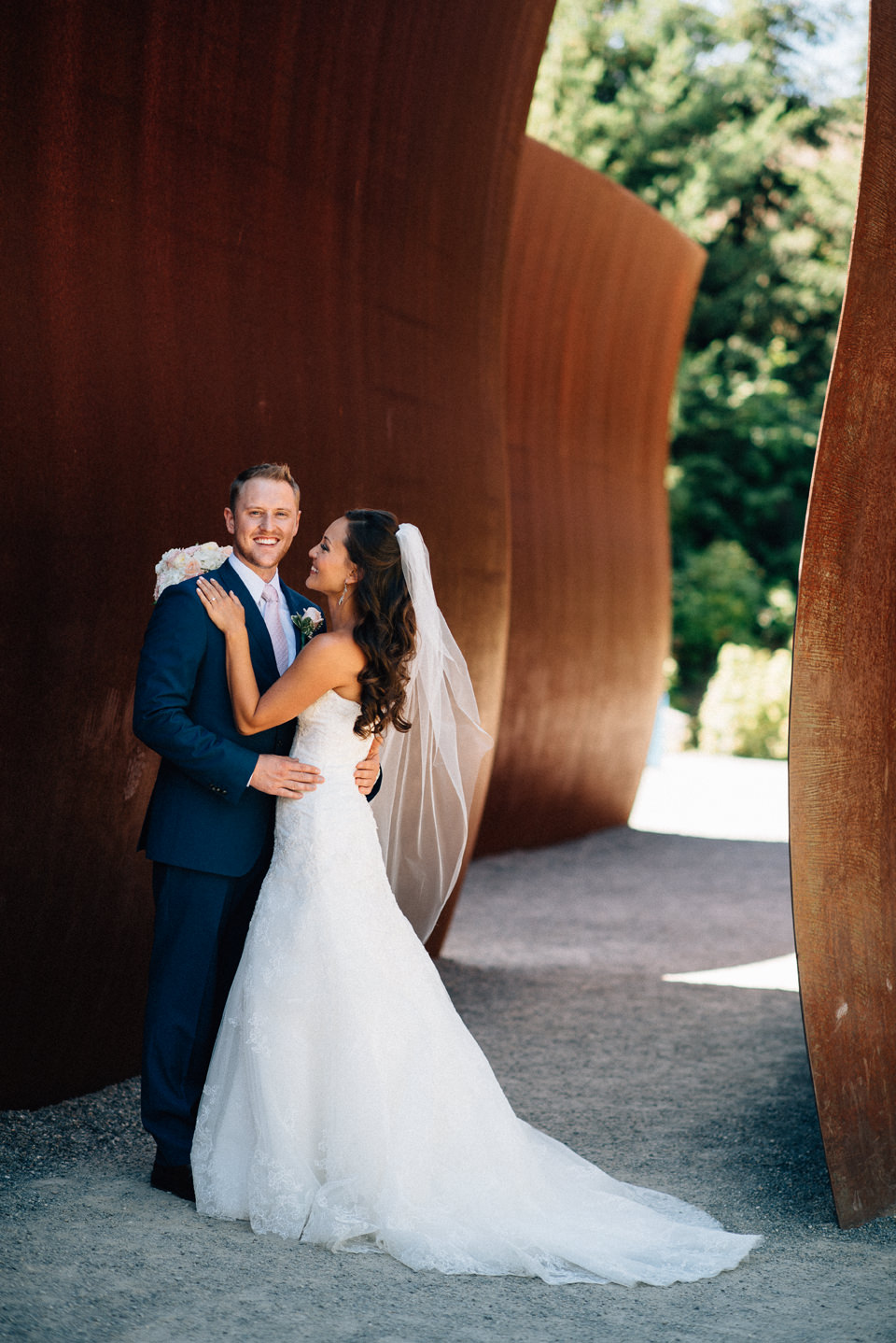 Kierstin and James pose for their wedding portraits at the Olympic Sculpture Park in Seattle