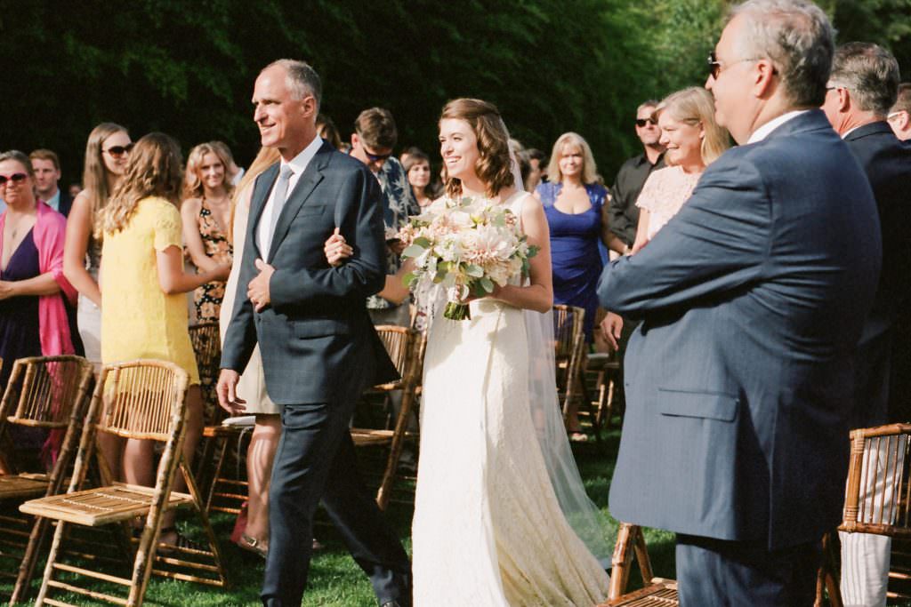 Zoe sees Daniel for the first time as her dad walks her down the aisle at Woodinville Lavender Farm, Washington, summer 2016
