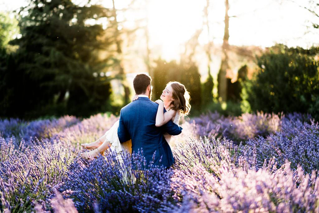 Zoe and Daniel happily dance in the lavender fields of Zoe and Daniel walk through the lavender fields of Zoe and Daniel walk down the aisle at their wedding at Zoe and Daniel share their first kiss as husband and wife at Woodinville Lavender Farm, Washington, summer 2016