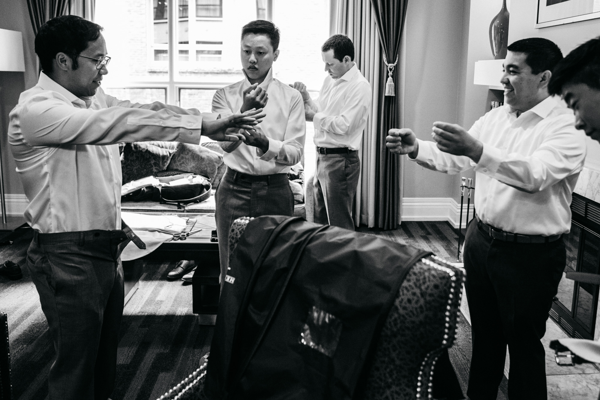 Jeremy and his groomsmen get ready for Jeremy's wedding at Alexis Hotel, Seattle WA. 