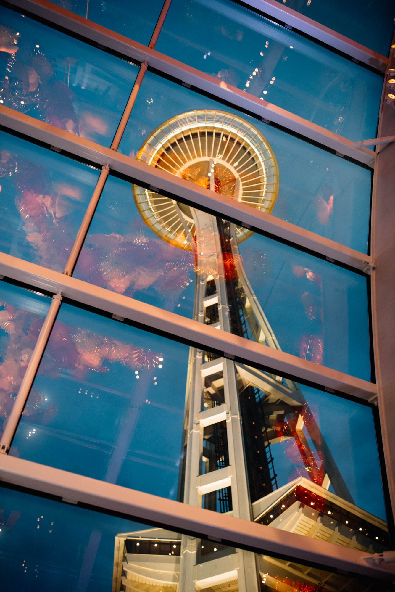 The Seattle Space Needle from the Chihuly Garden and Glass, dusk.