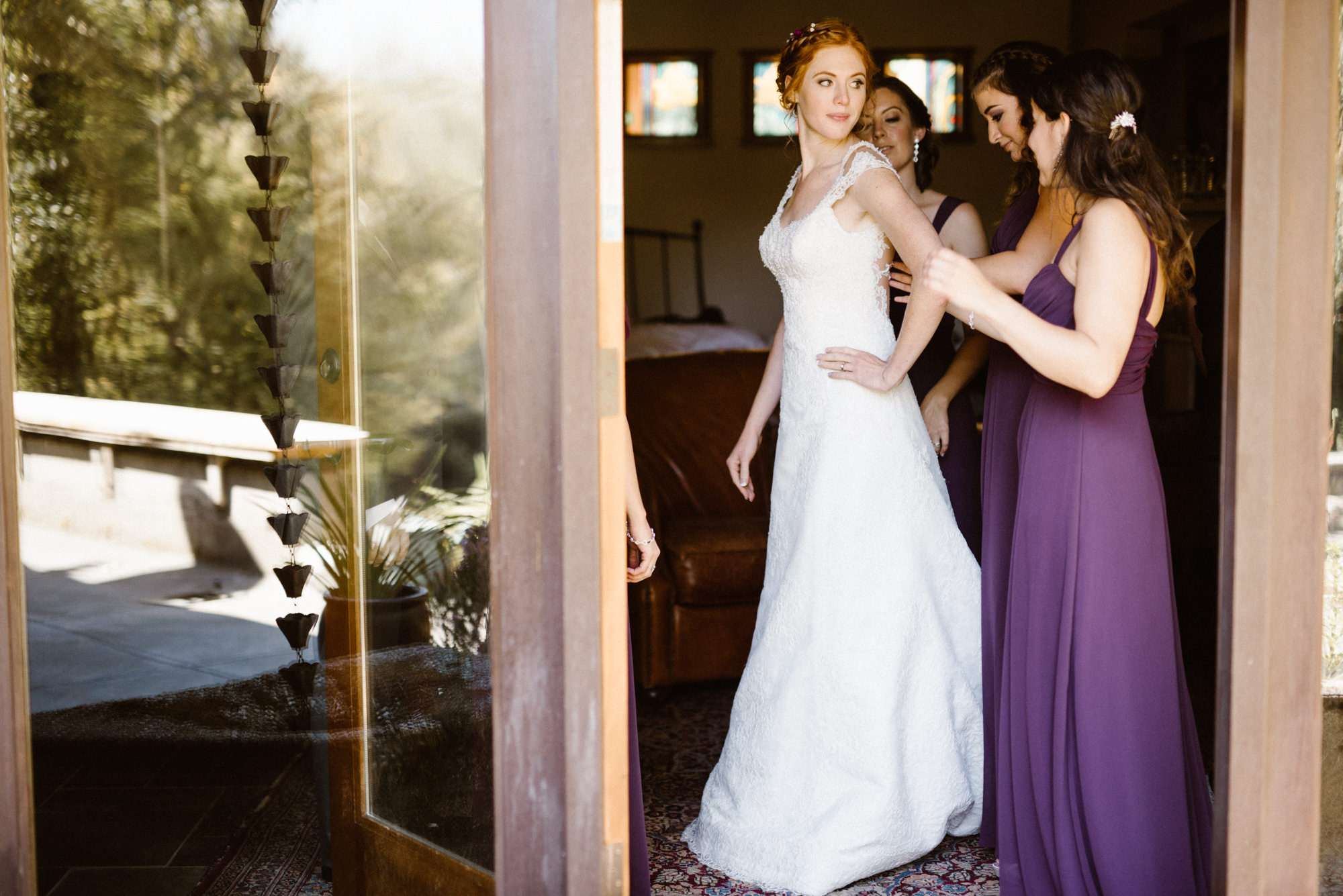 Katherine getting ready with her bridesmaids at Kingston House, a wedding venue in Kingston, Washington.