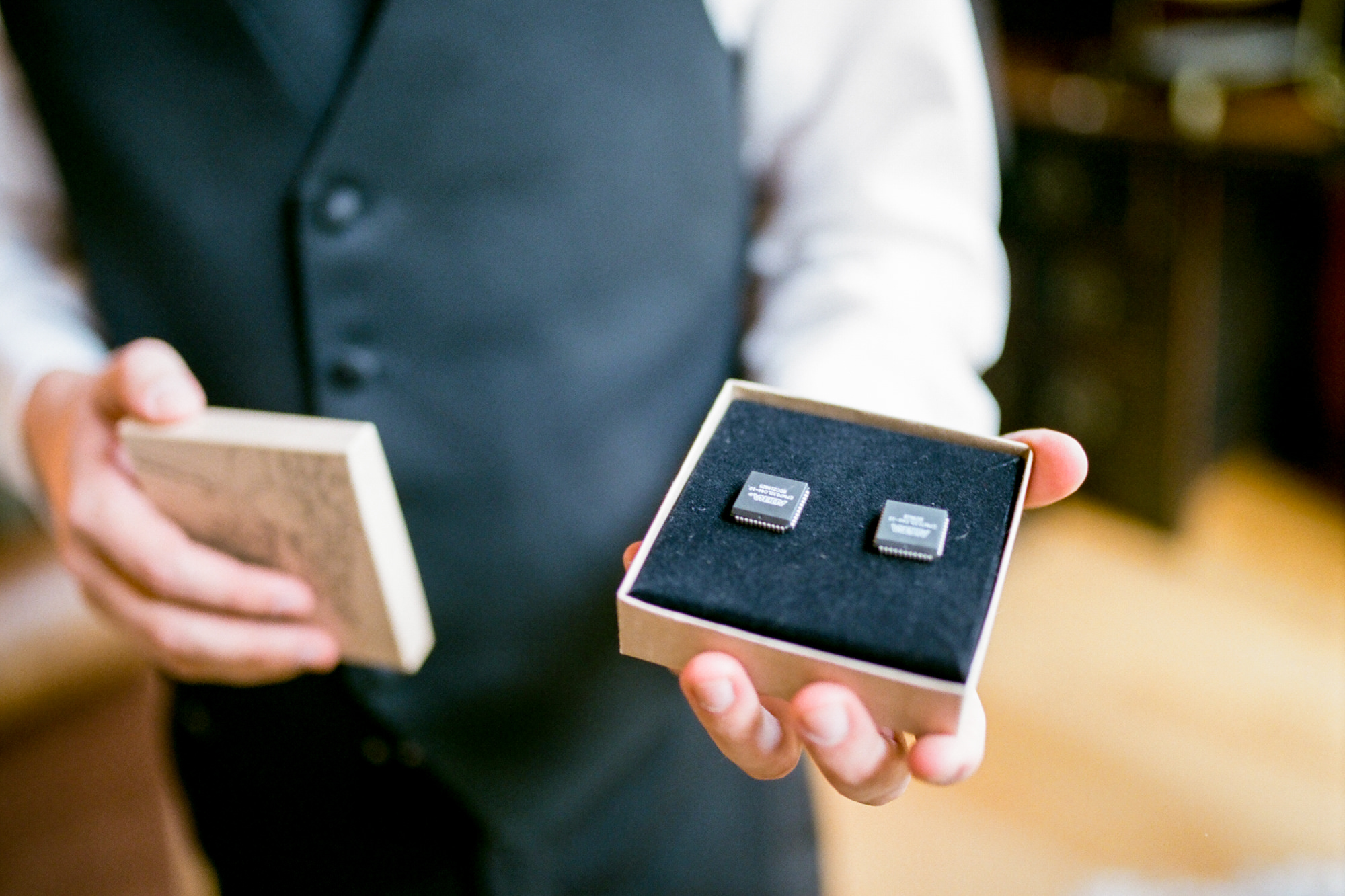 Katherine gave Graeme some cool computer chip cufflinks for their wedding day at KIngston House.