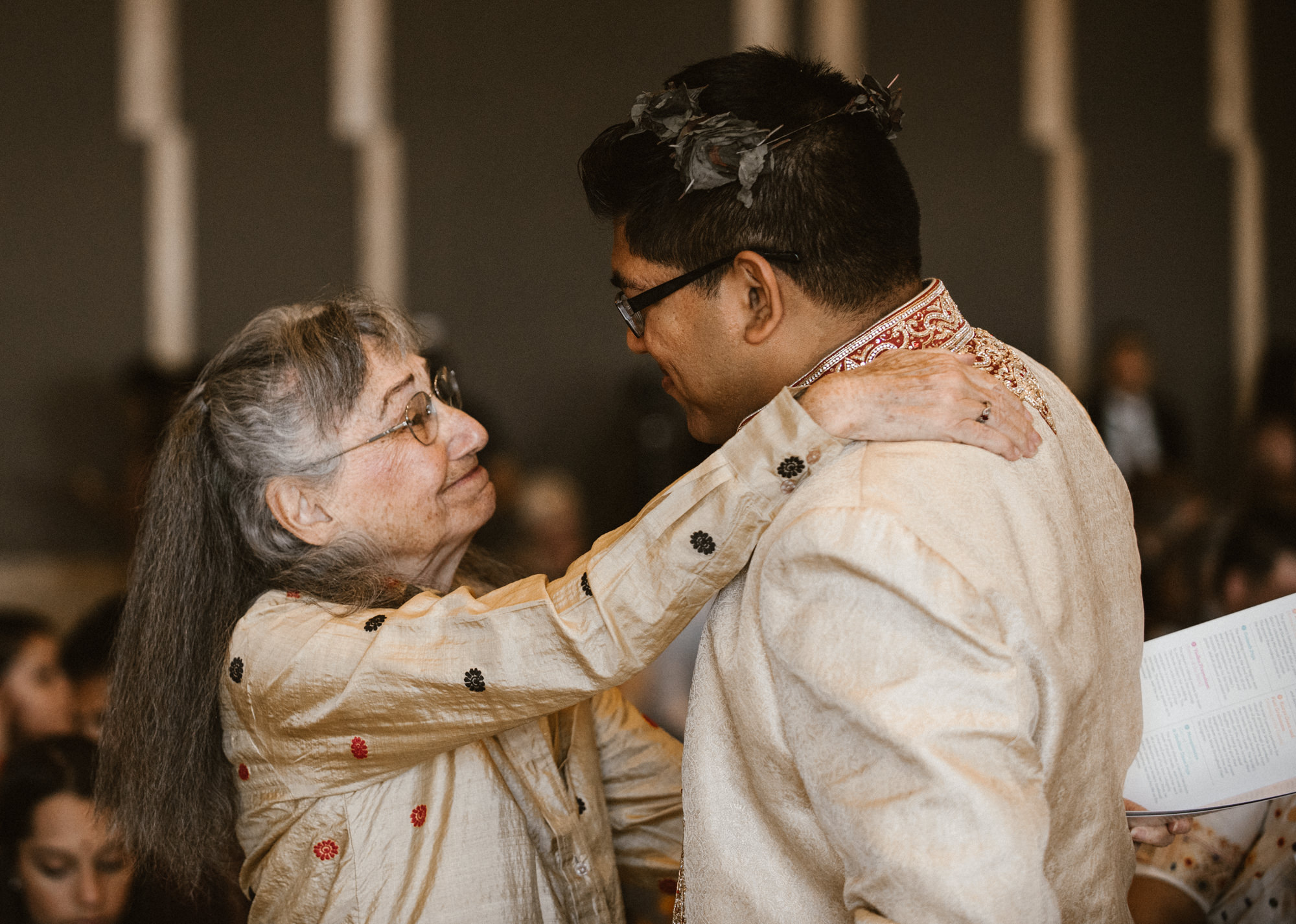 Neel getting a welcome from his aunt to his Hindu wedding at the Four Seasons Hotel, Seattle.