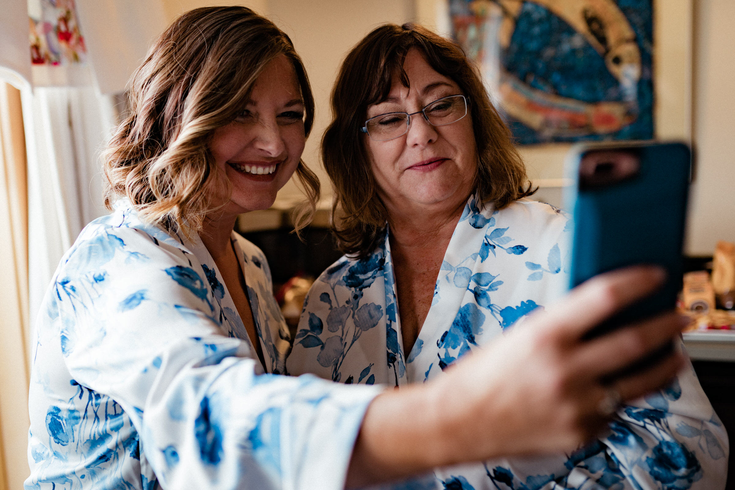 Whidbey Island Wedding: Sara's mom and sister-in-law take a selfie while getting ready for the wedding