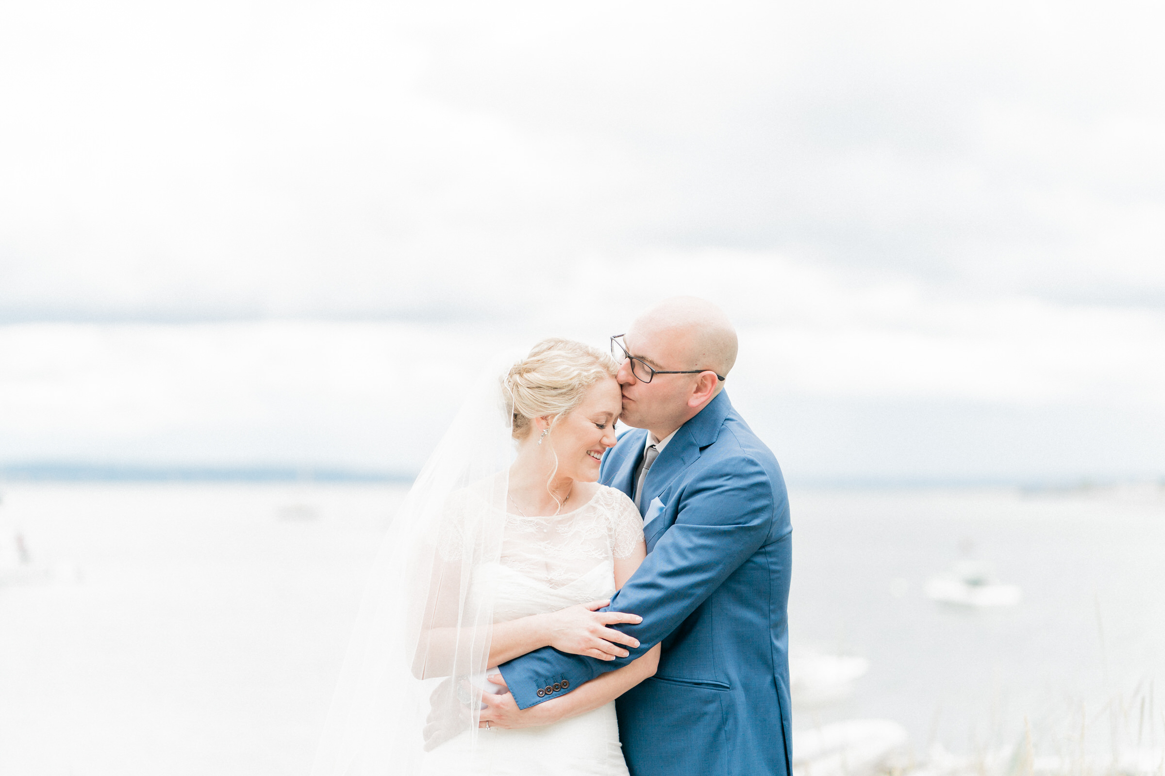 Boatyard Inn Whidbey Island wedding: Lovely moment of Sara and Joe after their First Look.