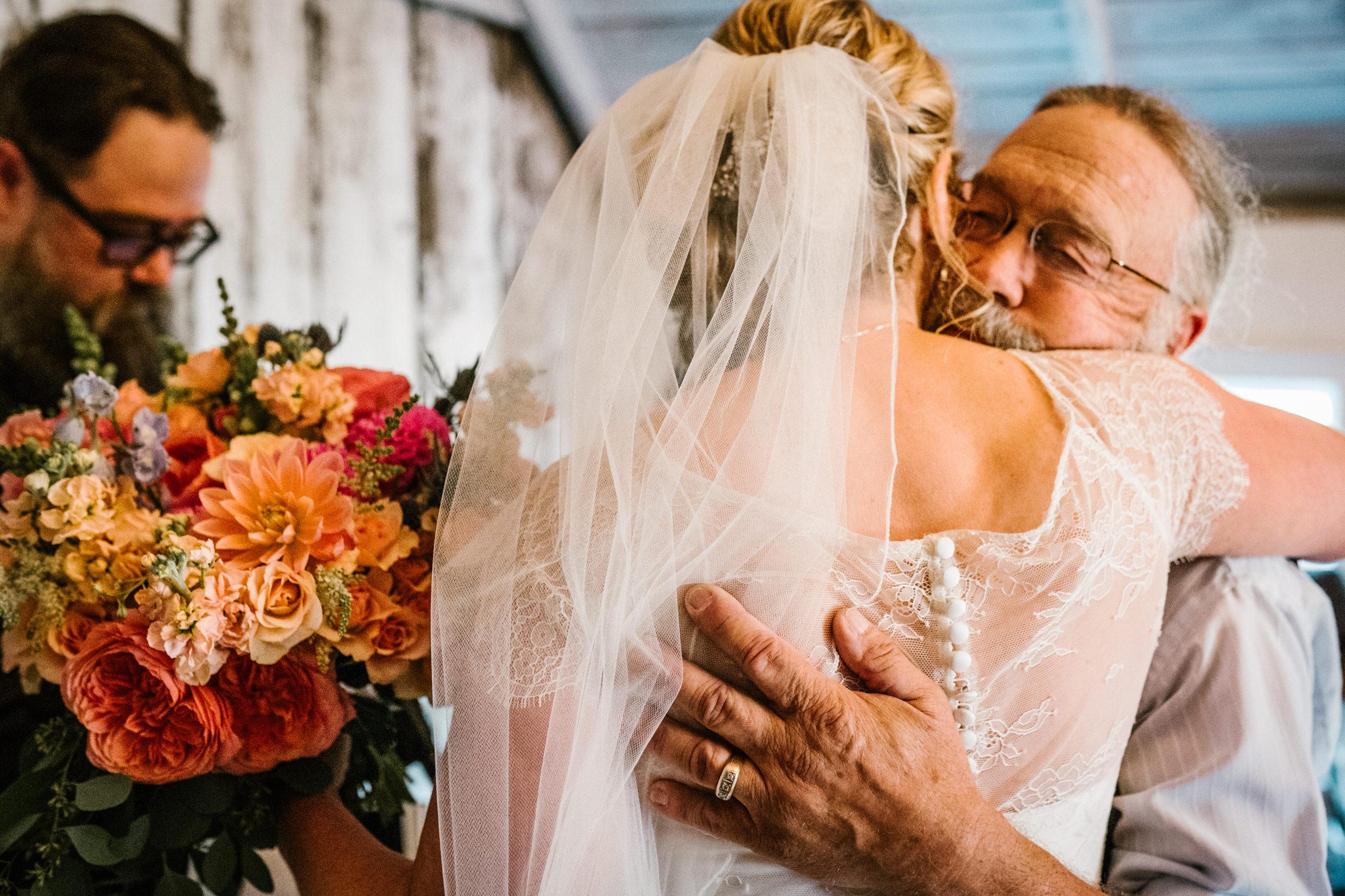 Wayfarer Whidbey Island Wedding: Sara hugs her dad