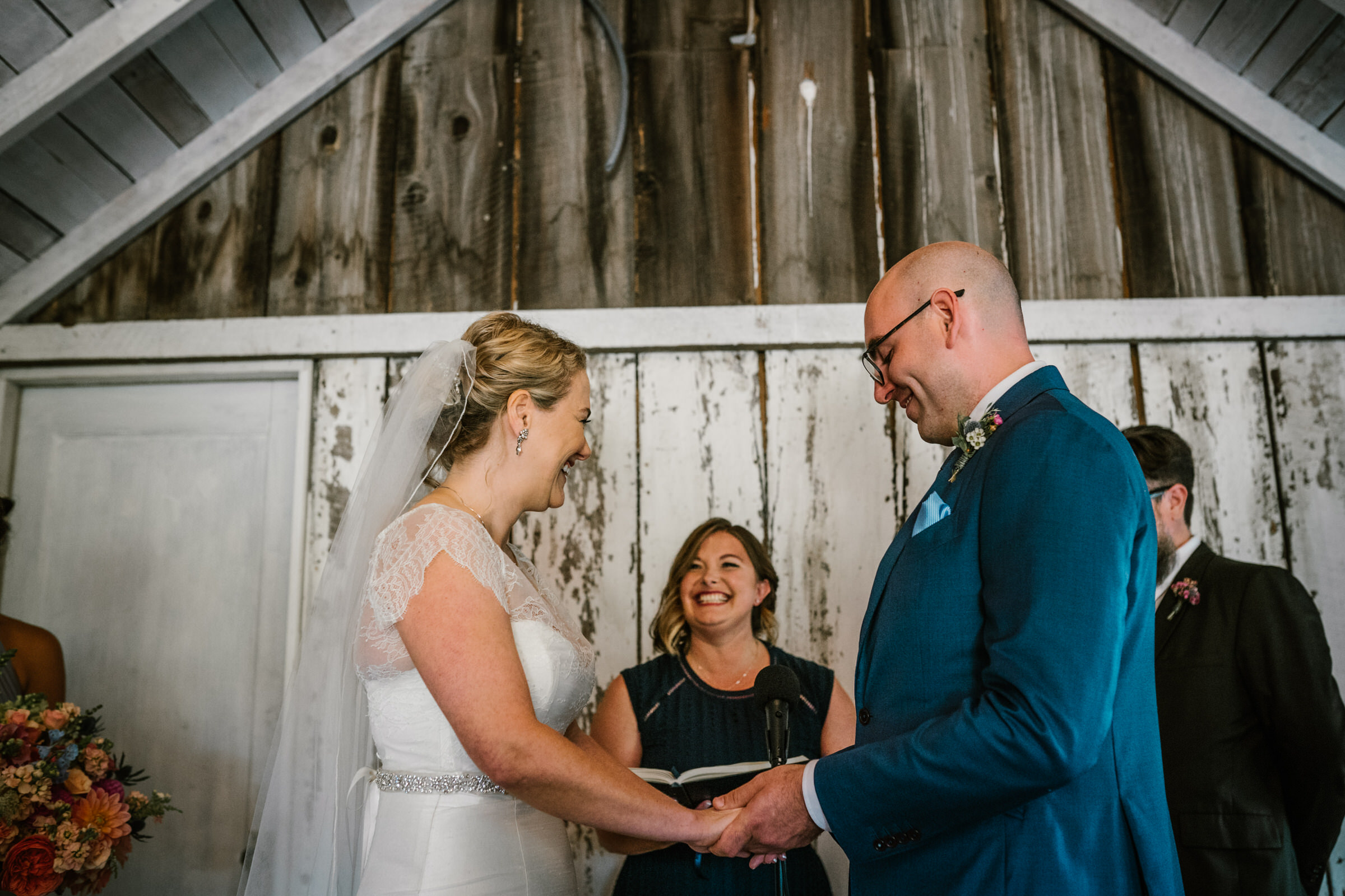 Wayfarer Whidbey Island Wedding: Sara joins Joe at the front as her brother and sister-in-law officiate the wedding