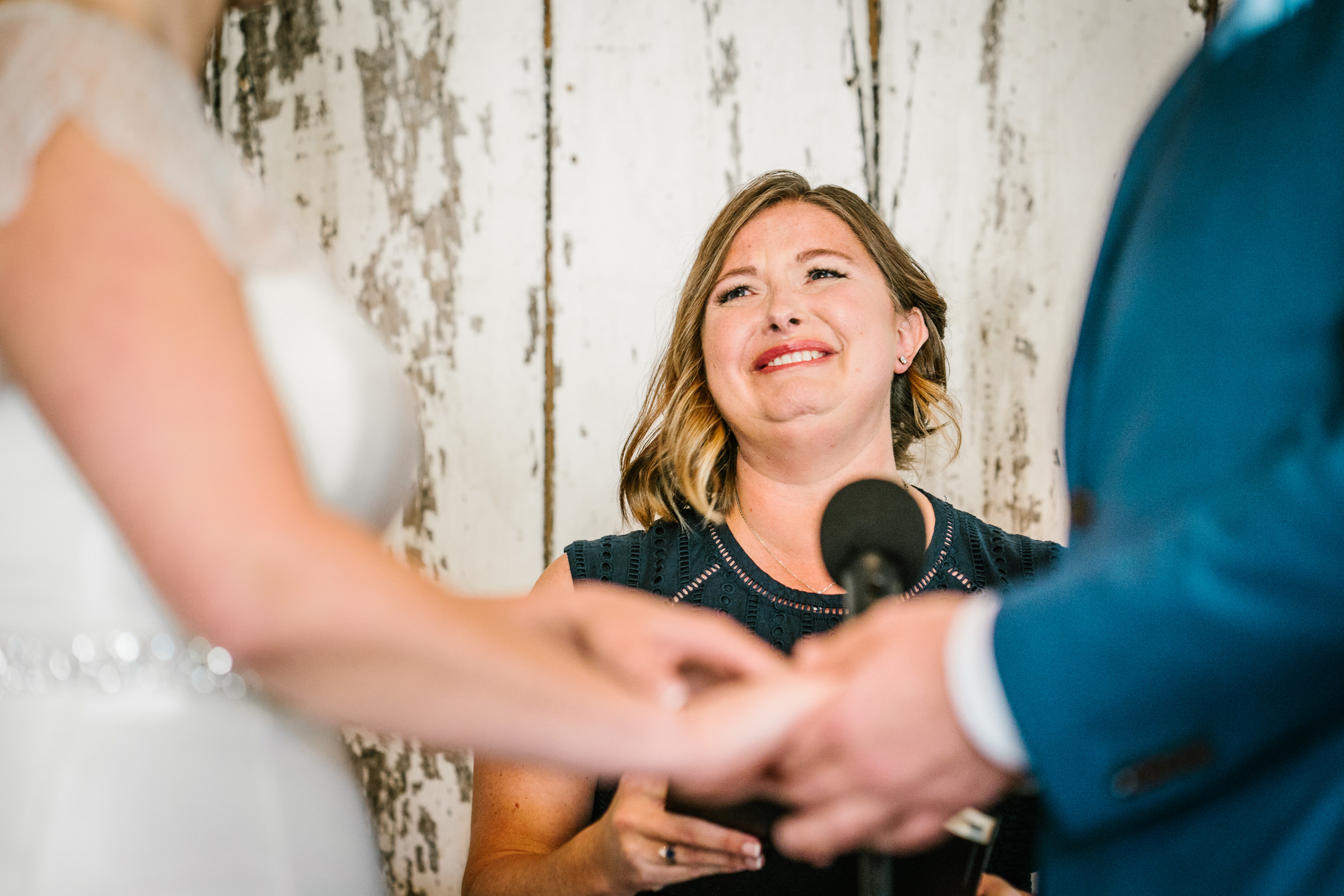 Wayfarer Whidbey Island Wedding: Sara's sister-in-law tears up as she officiates their wedding