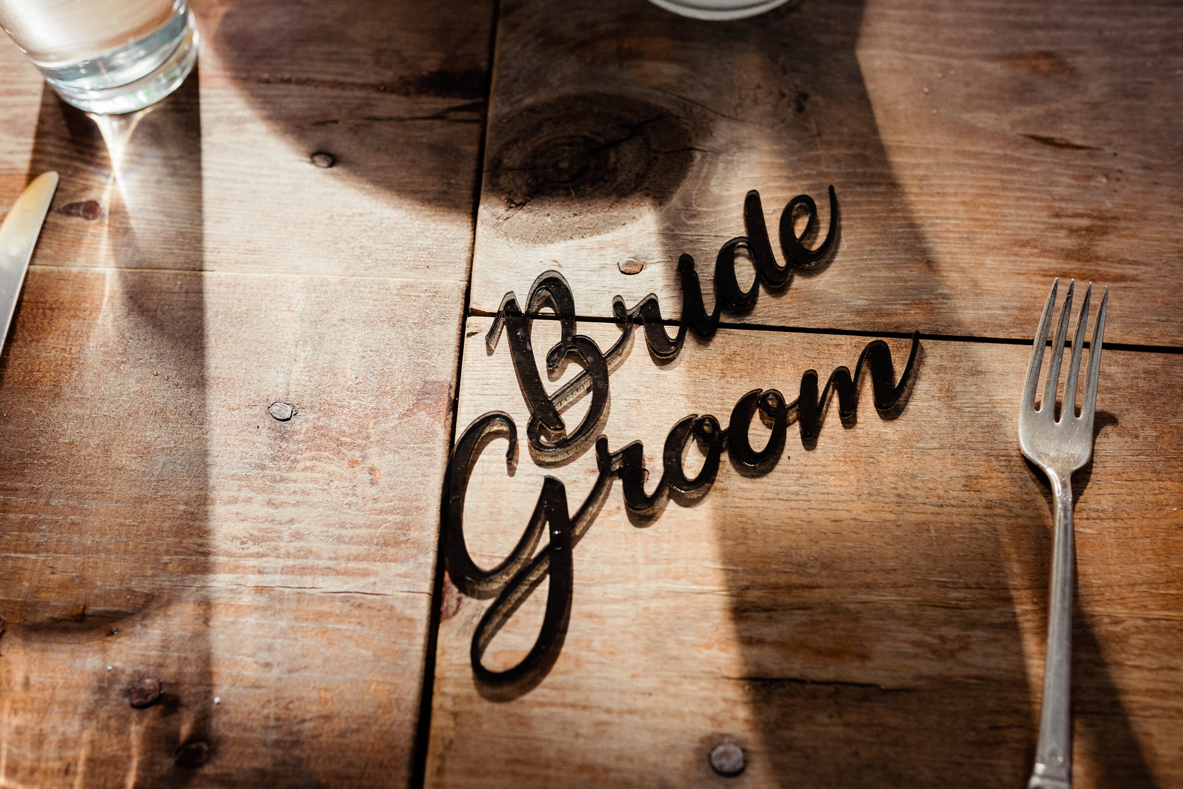 Wayfarer Whidbey Island Wedding: LAser cut bride and groom table placecards