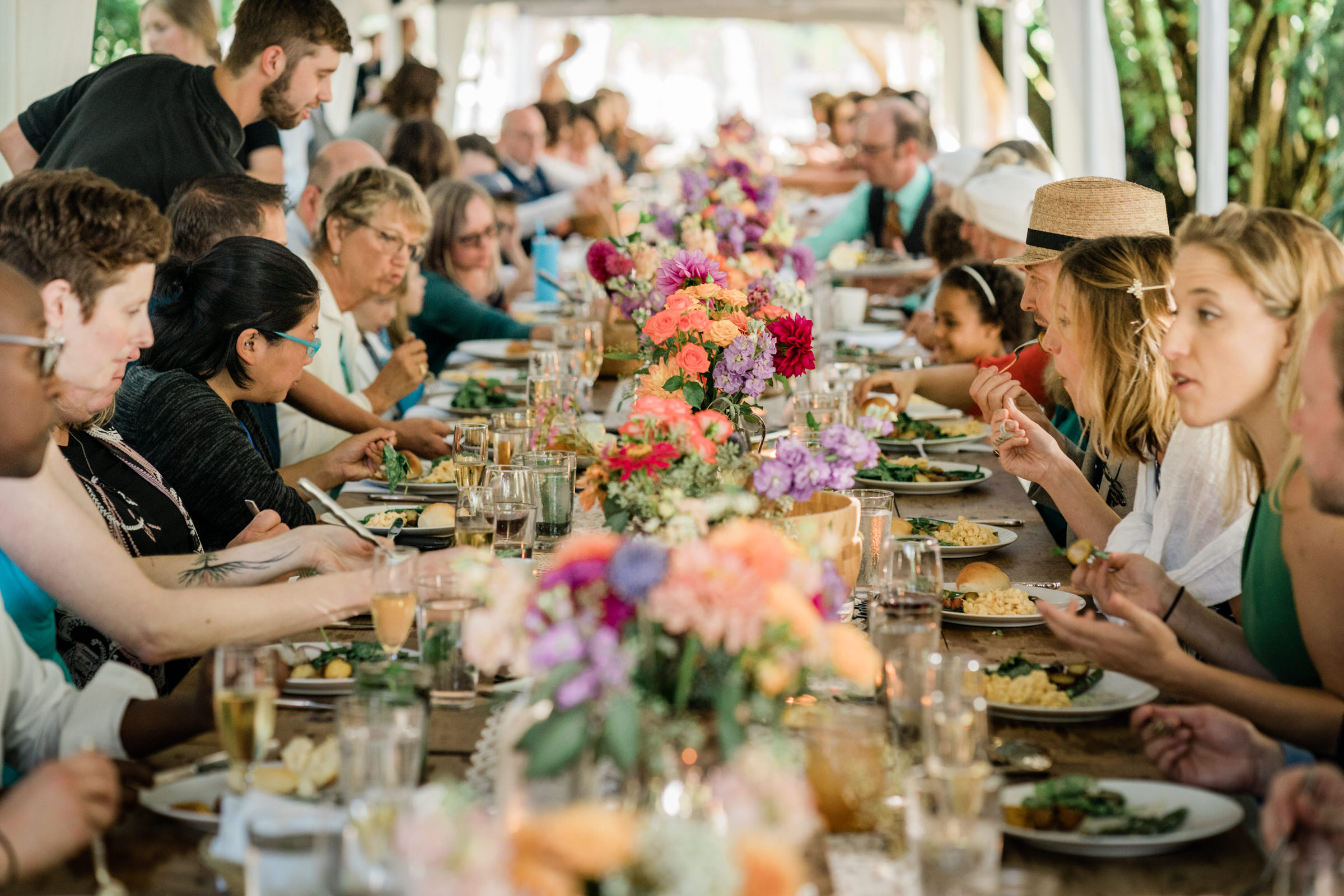 Wayfarer Whidbey Island Wedding: Wedding guests enjoying the sumptuous food at a wedding