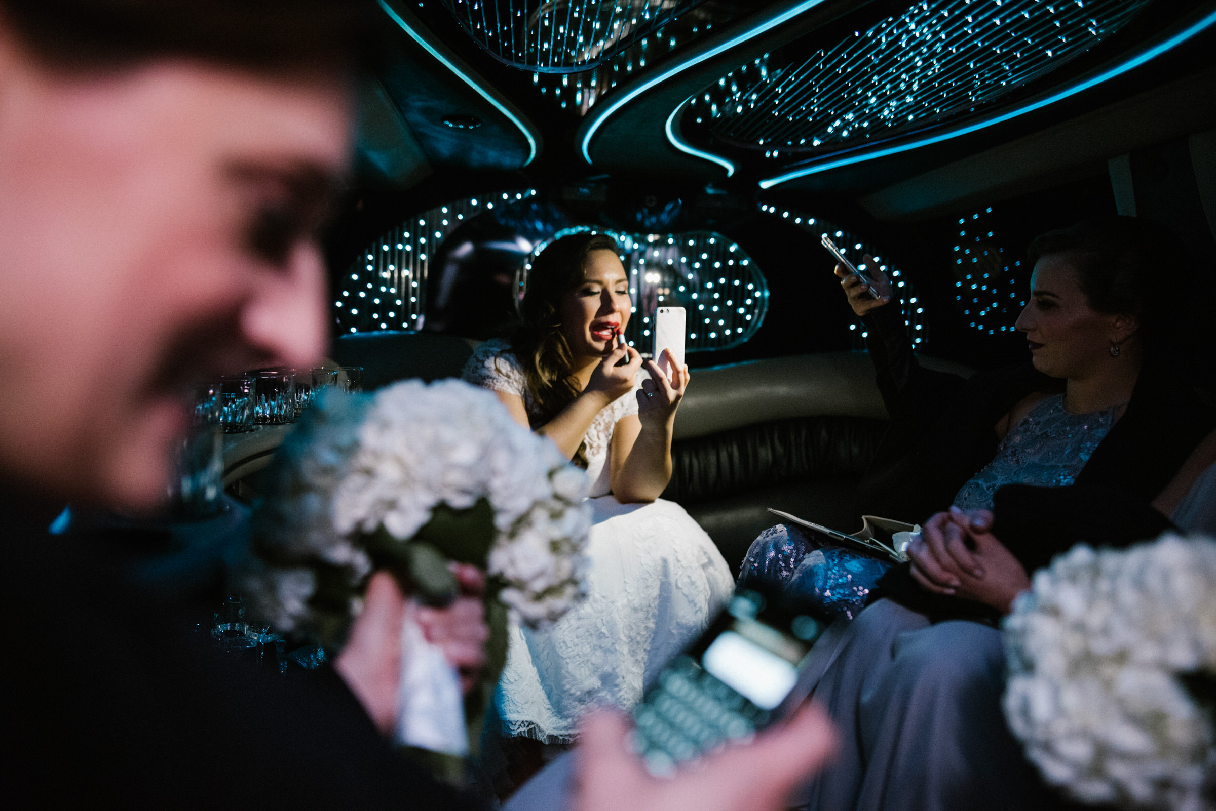 Nina and Nick ride their sweet limo to the Arctic Club in Seattle for their wedding reception