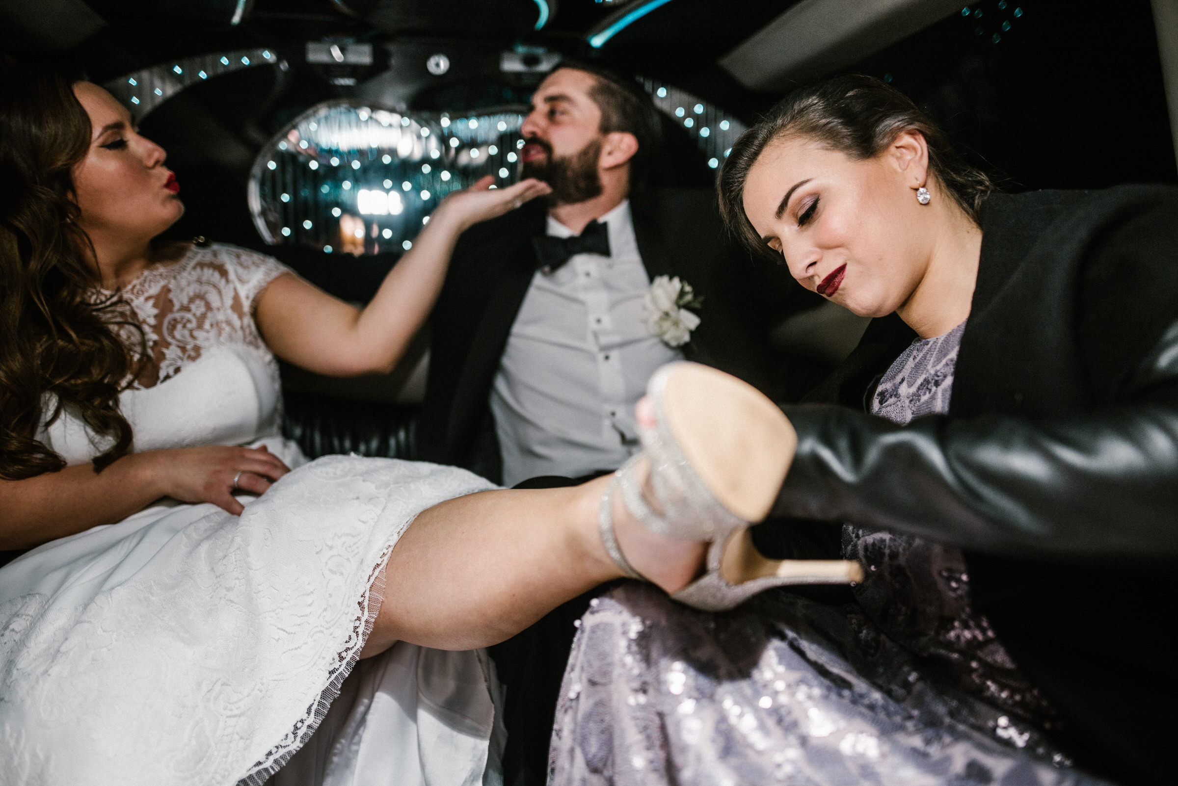Nina and Nick ride their sweet limo to the Arctic Club in Seattle for their wedding reception