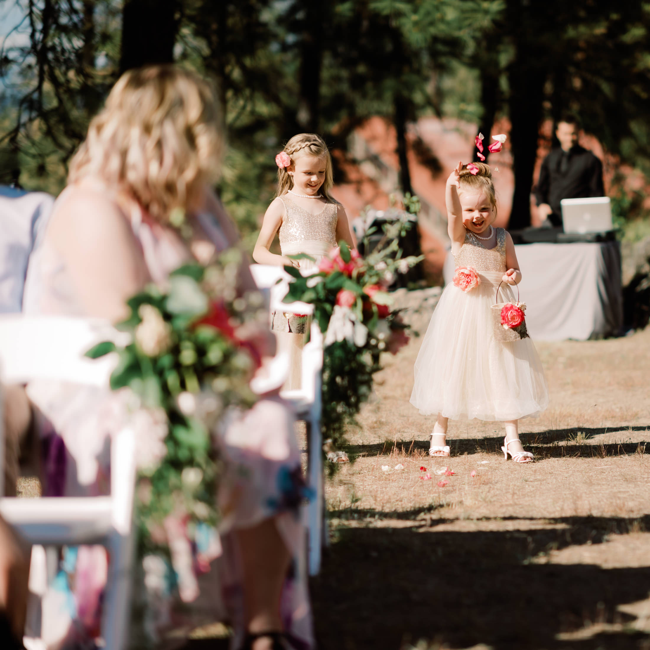 Sleeping Lady Resort weddings: Flower girls tossing petals at the processional