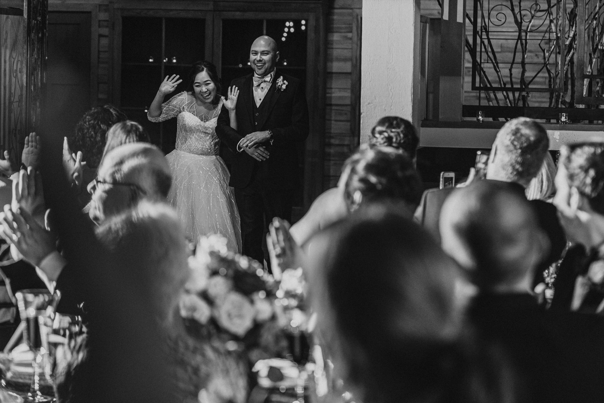 Emma and Joe's grand entrance into their wedding at the Foundry by Herban Feast