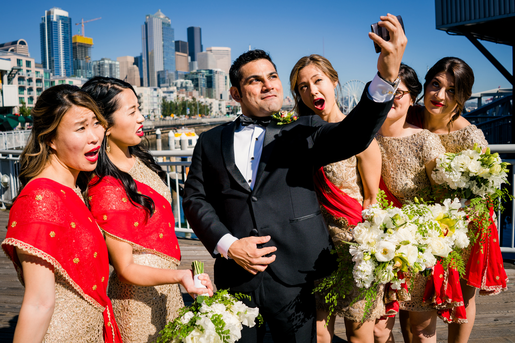 Groom and bridesmaids get a selfie. Photo by Jenn Tai, Seattle Wedding Photographer.