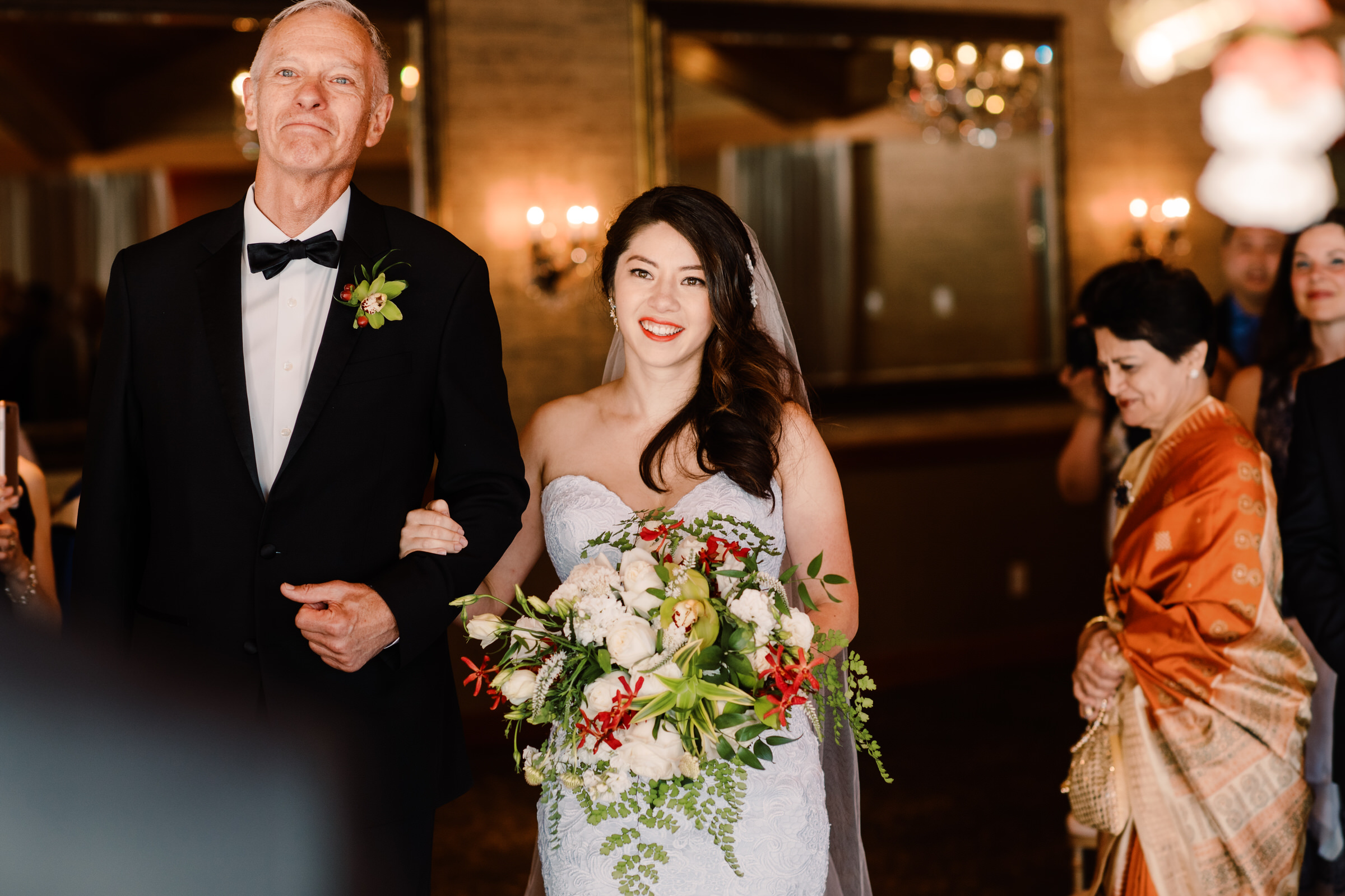 Bride Kelly and father walking down the aisle at the Edgewater. Photo by Jenn Tai, Seattle Wedding Photographer