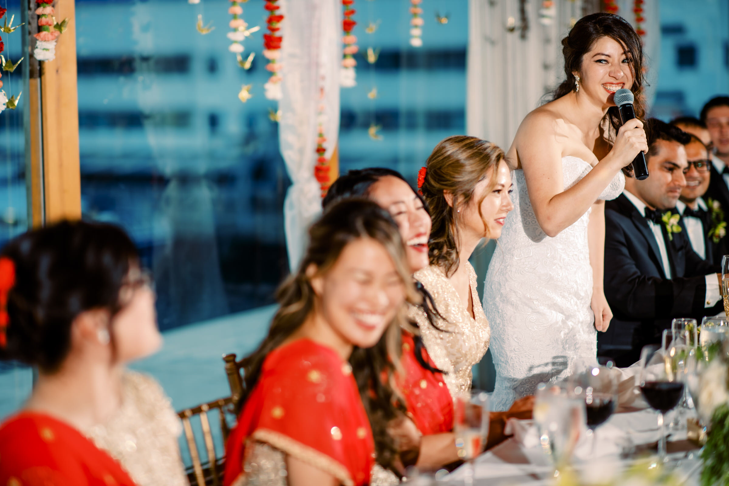 Bride gives a toast to her wedding party