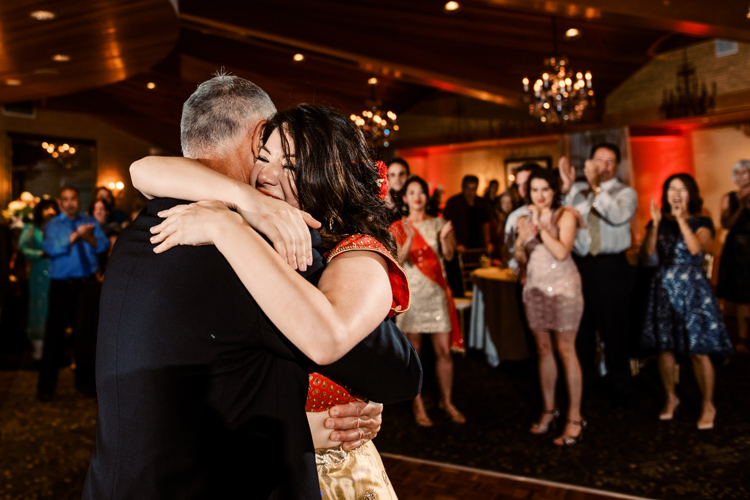 Kelly dances with her dad at her wedding