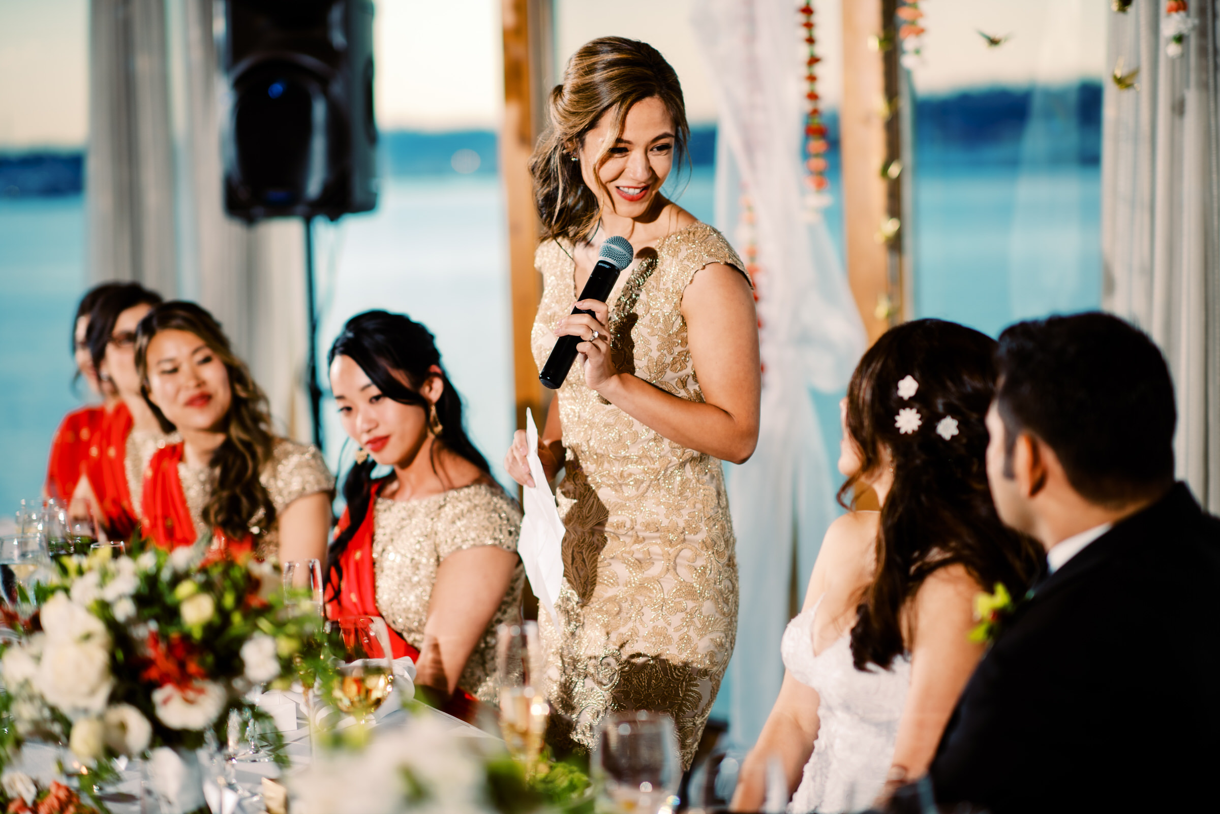 Matron of honor giving her toast at Kelly and Ash's wedding