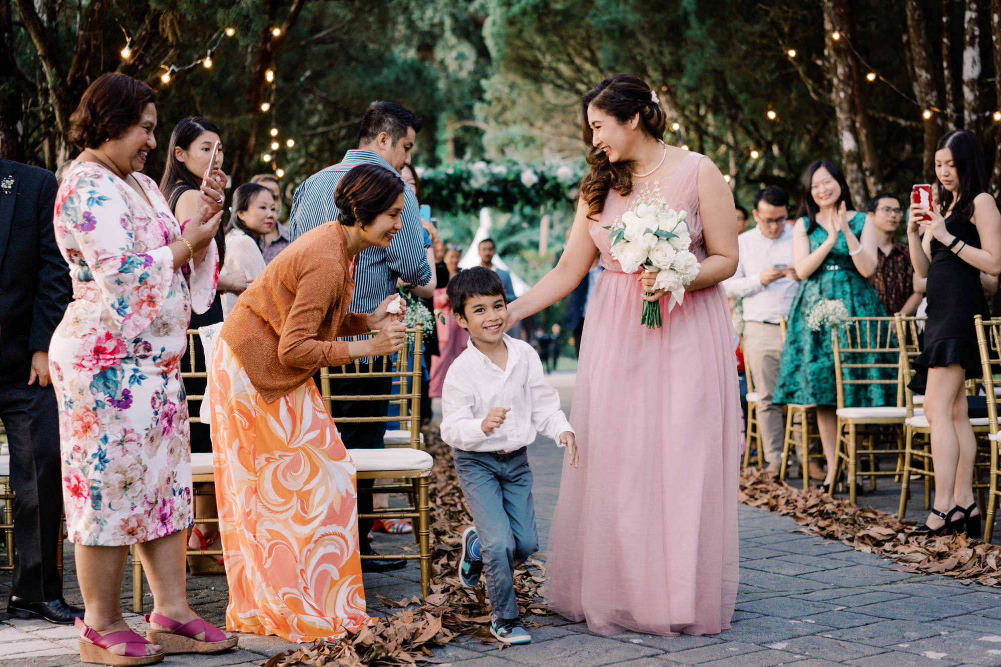 Nadira and her nephew at her wedding ceremony
