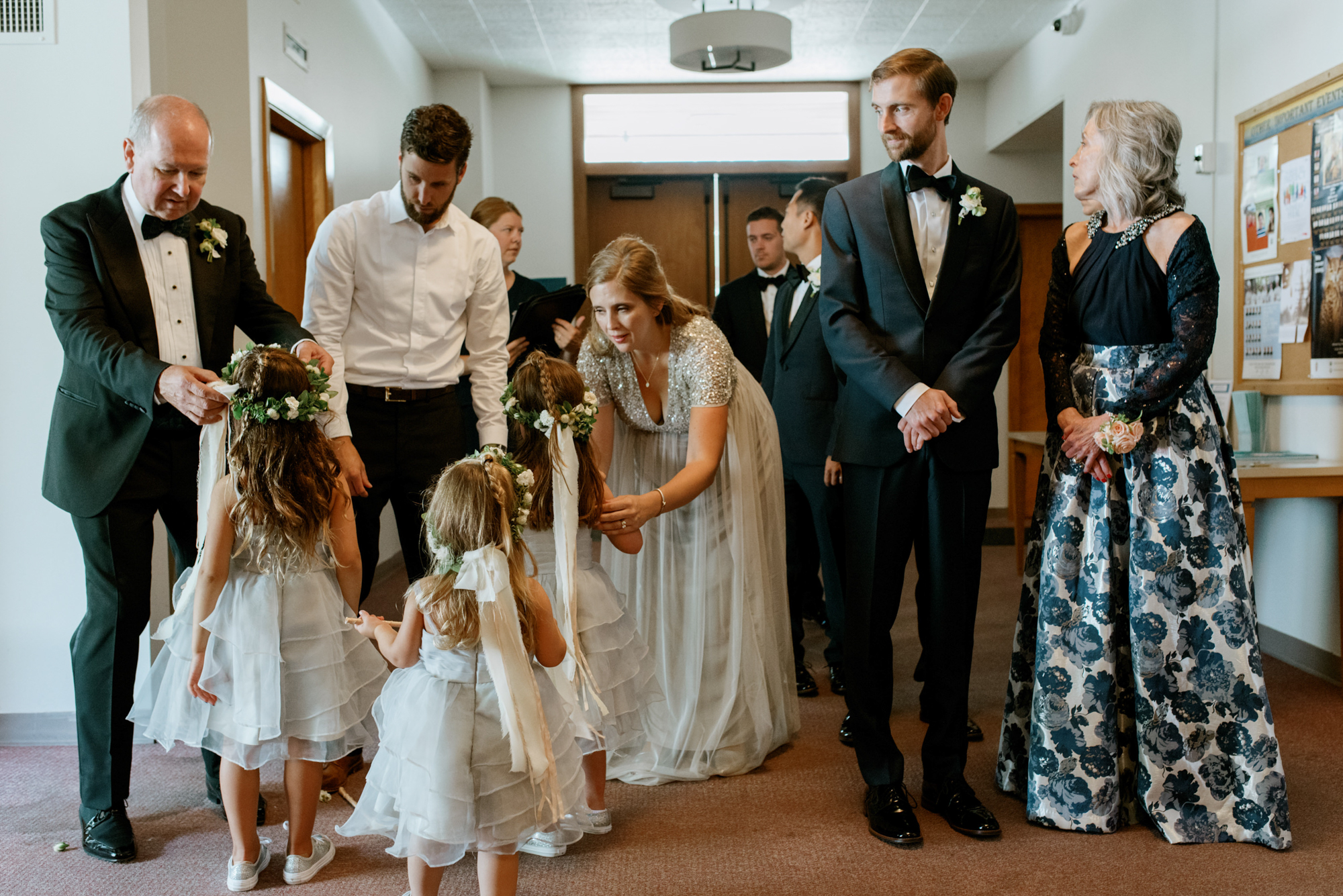 Wedding at Sacred Heart Church Seattle: Bridal party gets ready to walk down the aisle