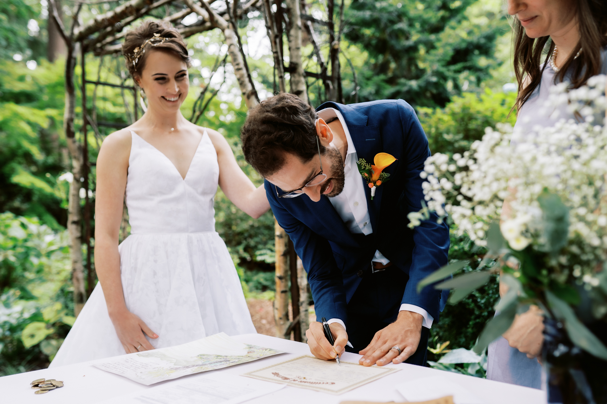 Dunn Garden Weddings: Amy and Scott sign documents