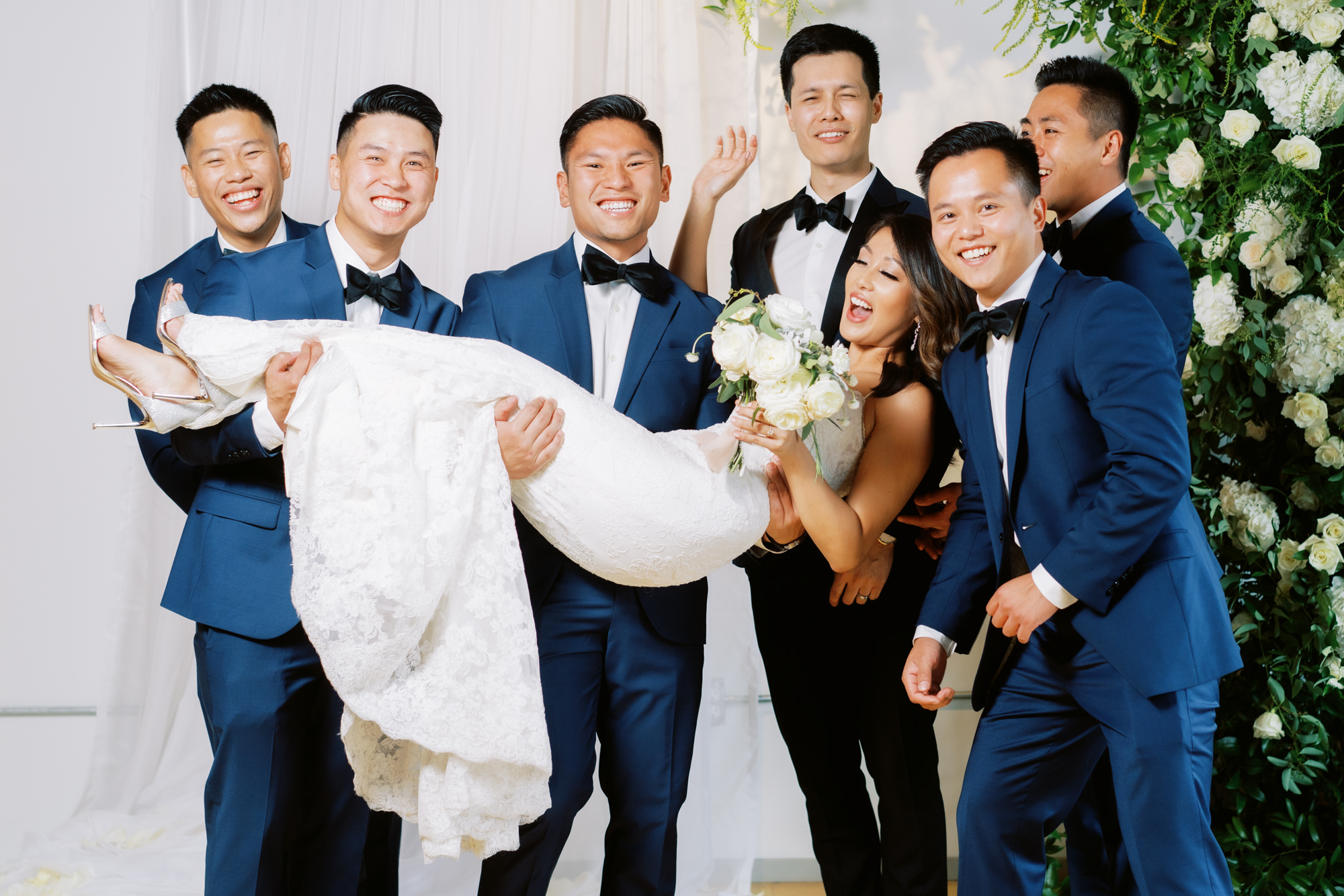 The Metropolist Seattle Weddings: Bride with groomsmen