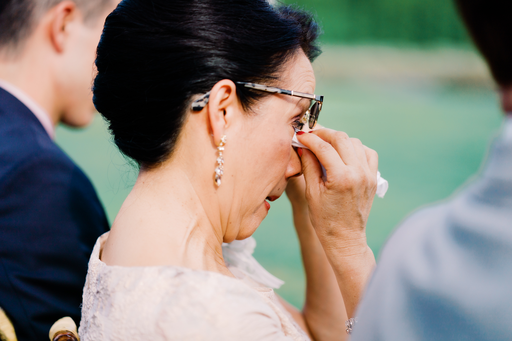 Bride's mom gets emotional during the wedding ceremony.