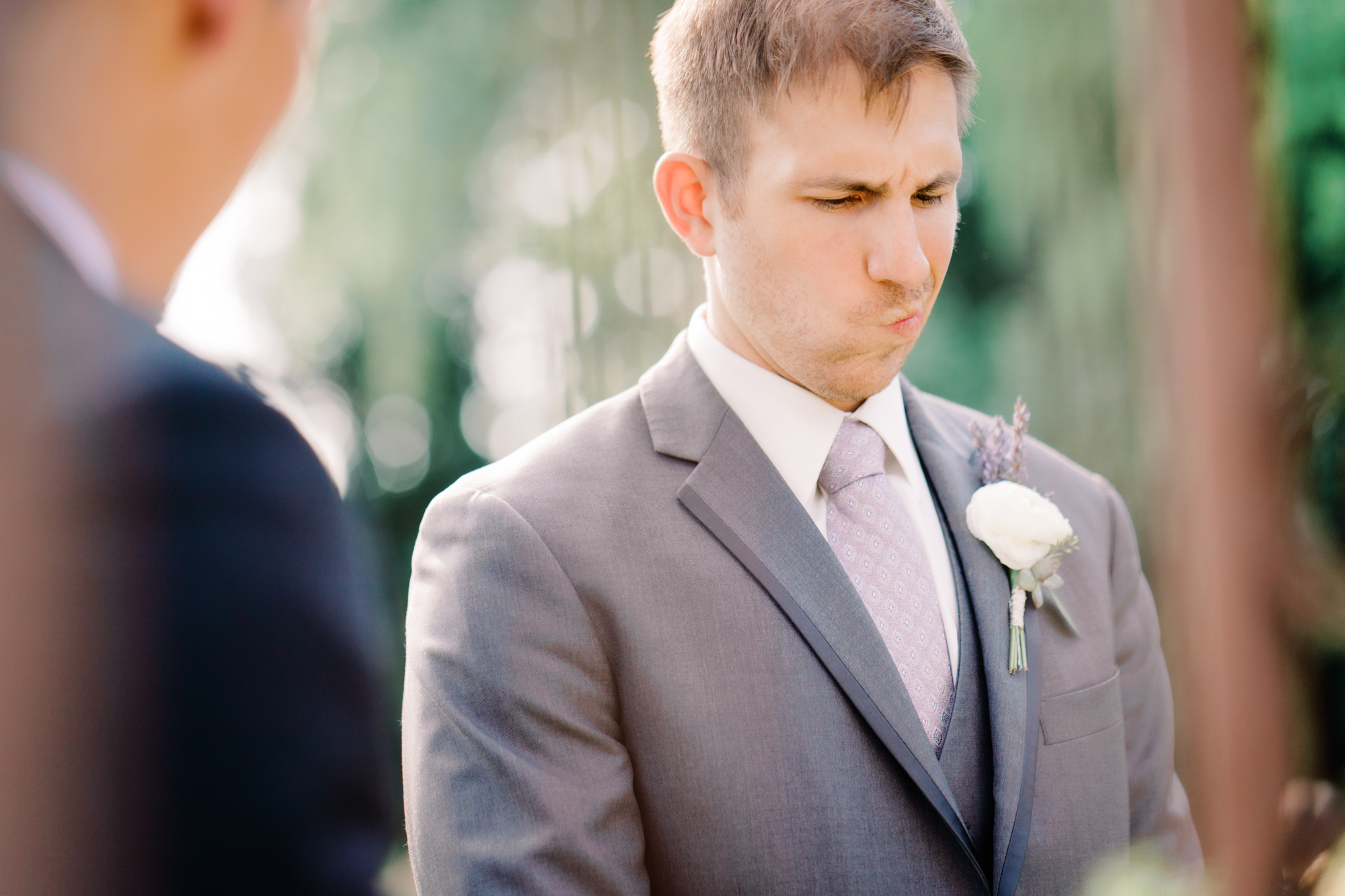 Groom Andres gets emotional during the wedding ceremony.