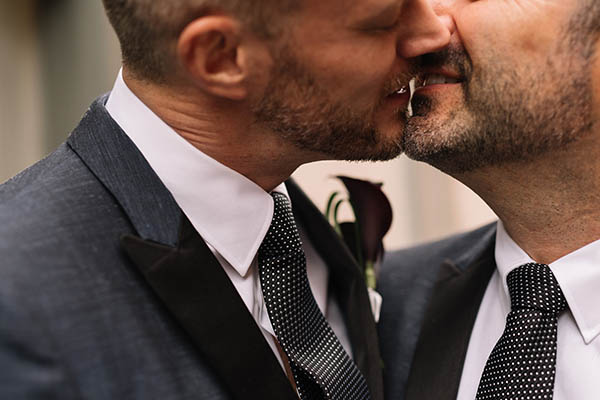 Grooms kissing on their wedding day - Jenn Tai & Co - Seattle wedding photography