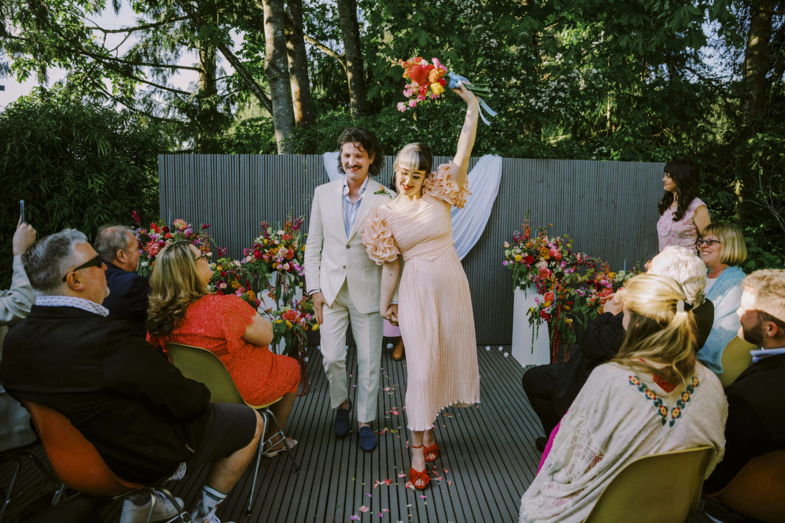 Married! Teresa and Shaun walk down the aisle, Seward Park, Spring 2022