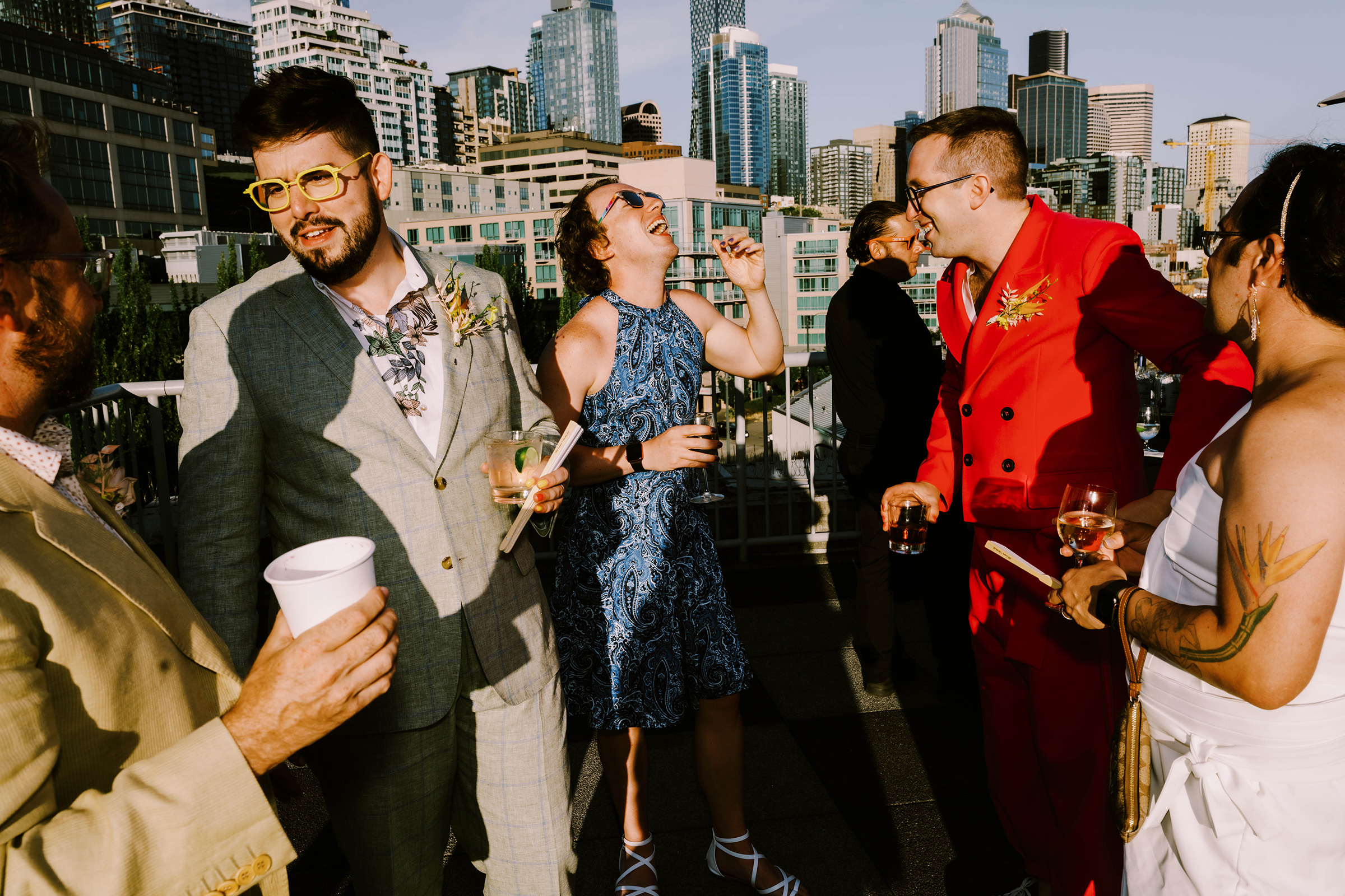 Dustin and Joey's wedding guests enjoying beautiful views on the Bell Harbor Conference Center rooftop, summer 2022