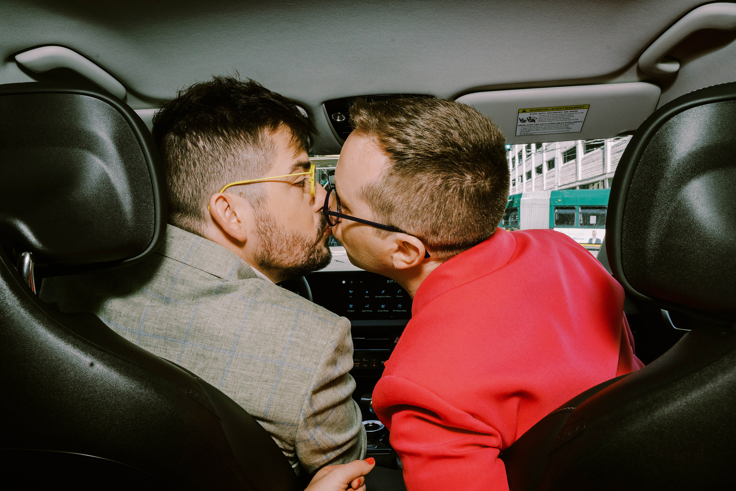 Joey and Dustin drive to their wedding at Bell Harbor Conference Center, Seattle, summer 2022